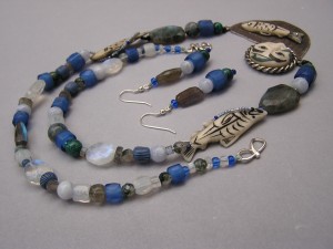 Fog woman necklace with various bohemian beads and blue Gooseberies